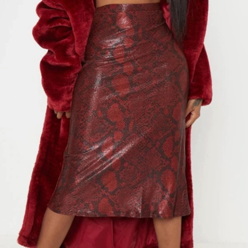 Red snakeskin midi skirt